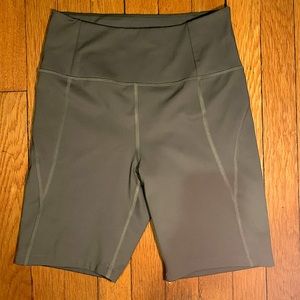 Girlfriend Collective high rise bike shorts in moss- size M